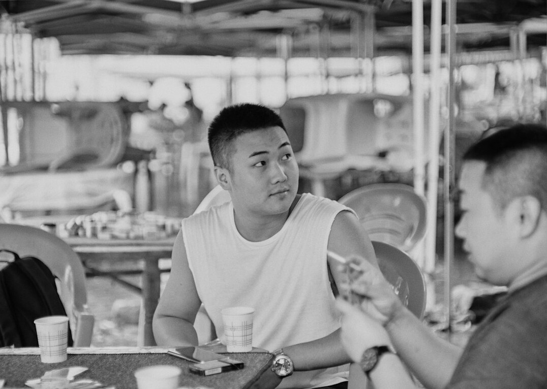 Two colleagues having a focused one-on-one conversation